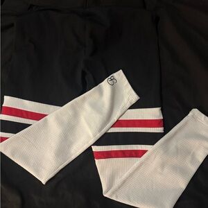 Bombshell Sportswear Black and White Leggings with Red Stripes